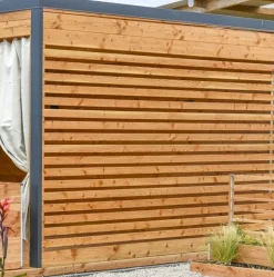 MON CHALET DE JARDIN - Studio de jardin DESIGN 9m² - Bois Douglas épaisseur 55mm - Porte coulissante alu - Toiture Bacacier avec voliges ss toiture